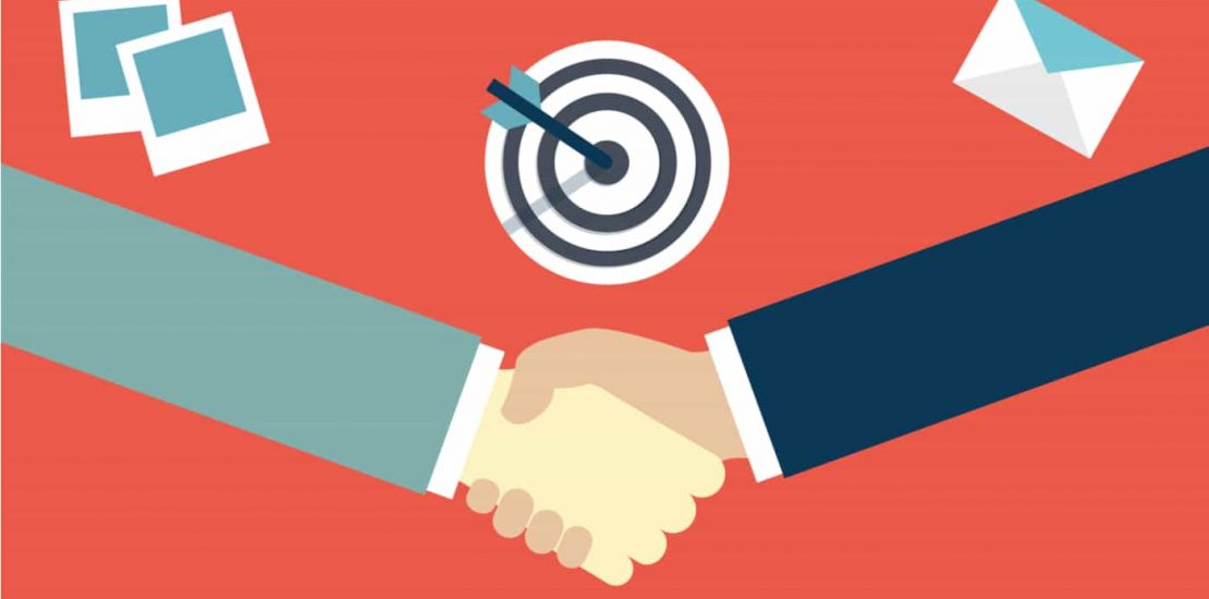 Ideal Customer Profile - Client shaking hands below target symbole